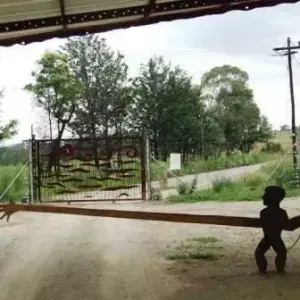 David Rossouw — View of gate and boom from under gatehouse roof - forum homini hotel cradle of mankind
